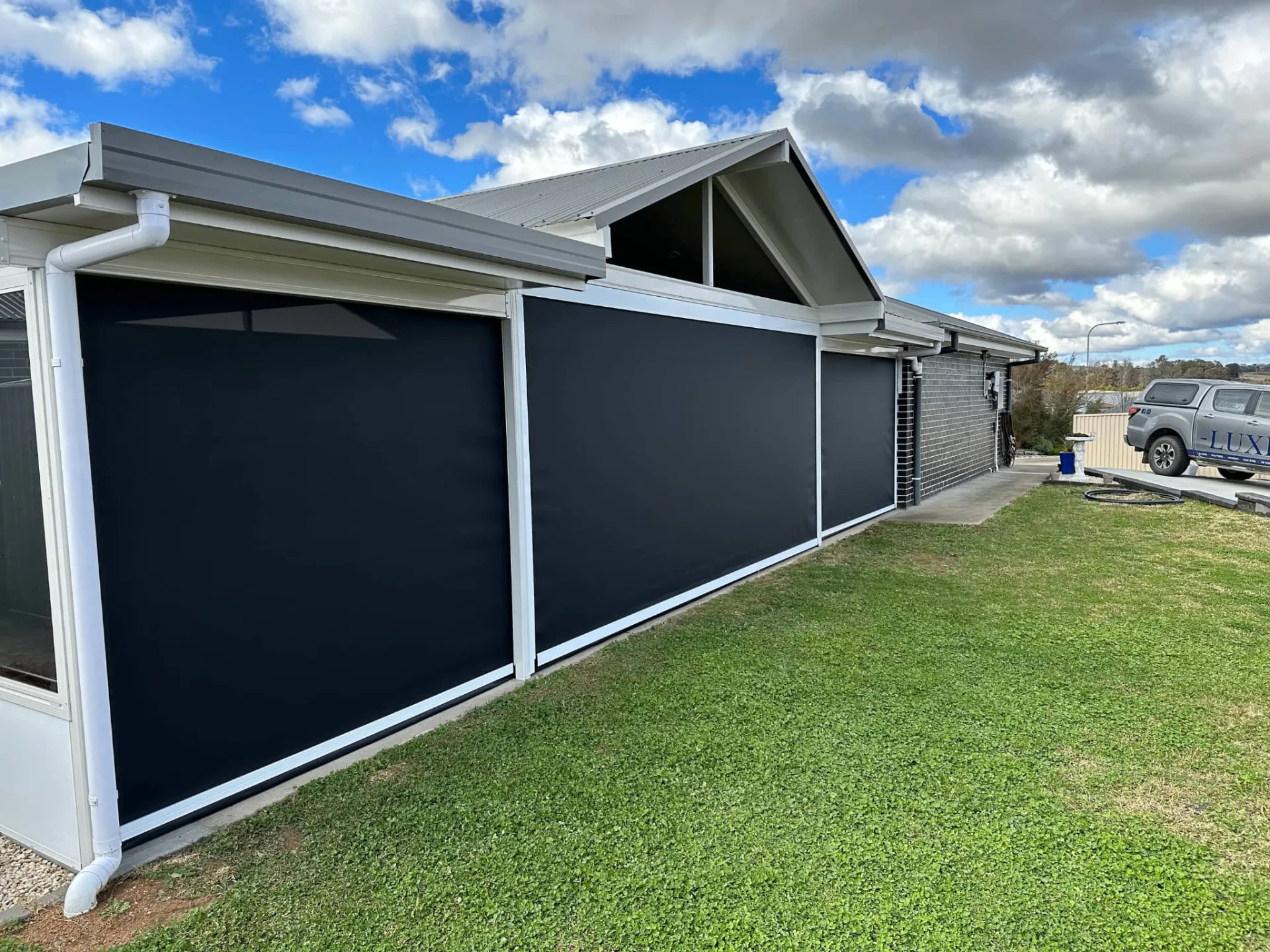 Side angle of zipscreen installation showing sleek profile