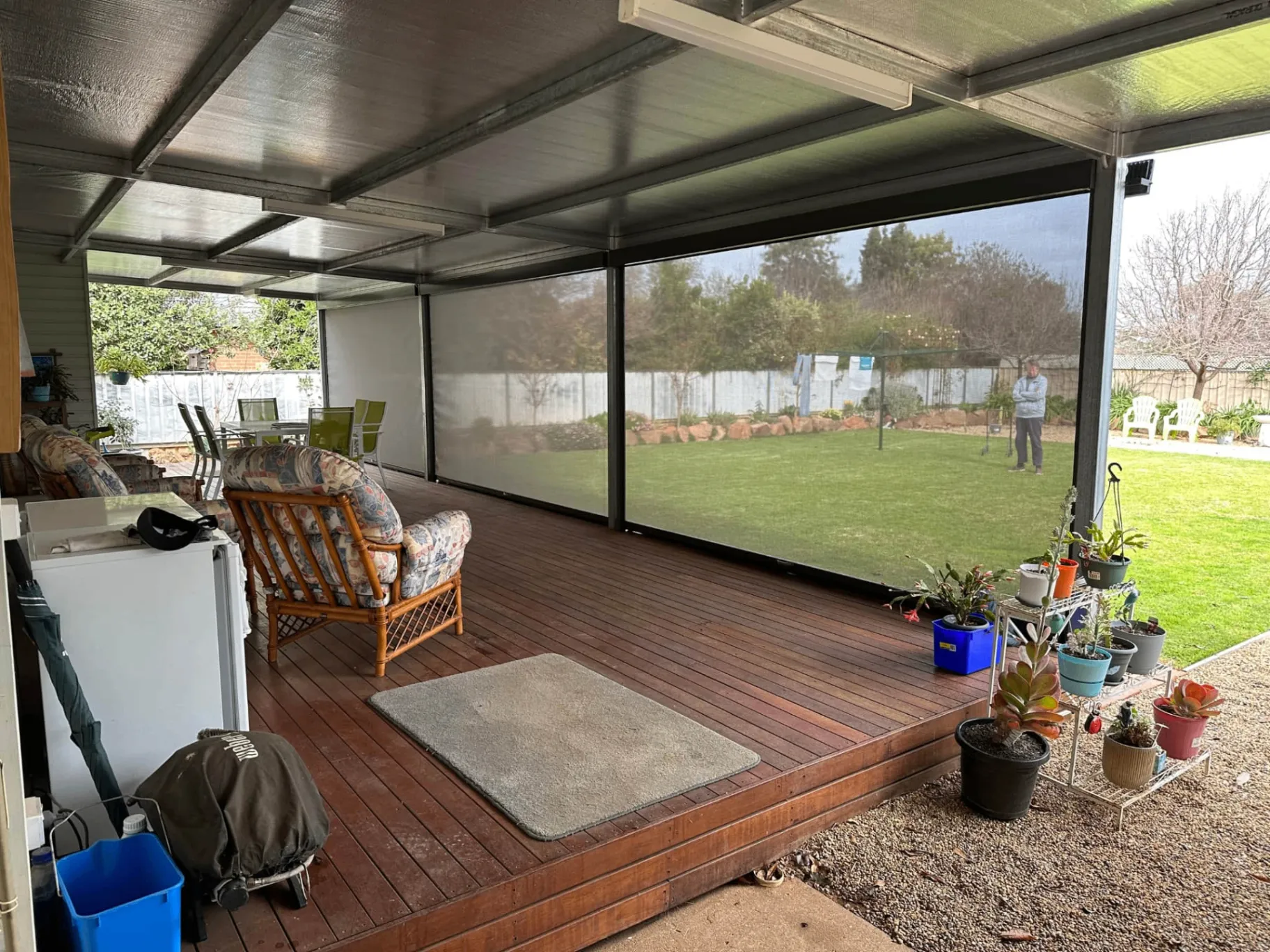 Interior view of enclosed deck area with blinds