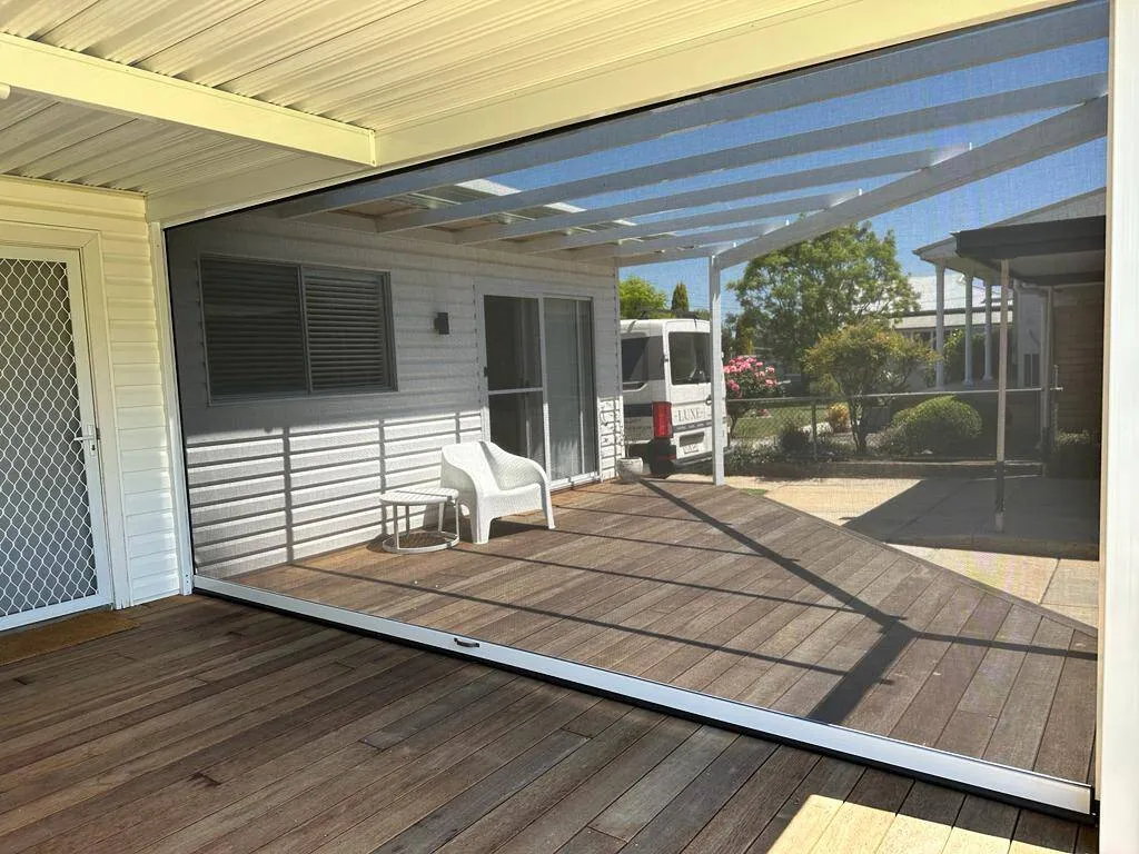 See-through mesh zipscreen on covered patio